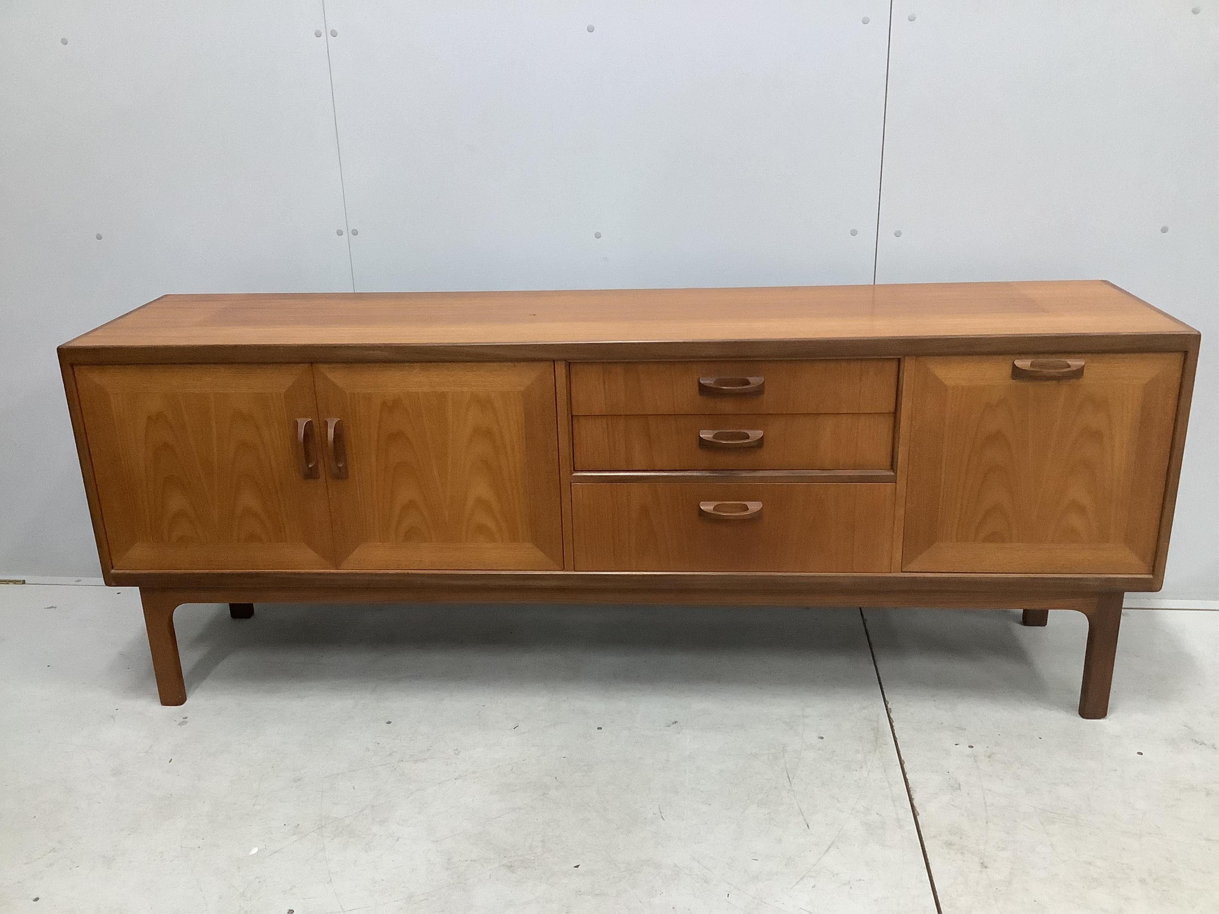 A mid century G Plan Sierra teak sideboard, width 205cm, depth 45cm, height 80cm. Condition - fair to good, some fading to top